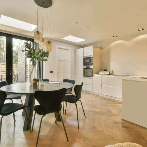 a-kitchen-and-dining-room-with-a-table-and-chairs-2023-11-27-05-20-58-utc-2